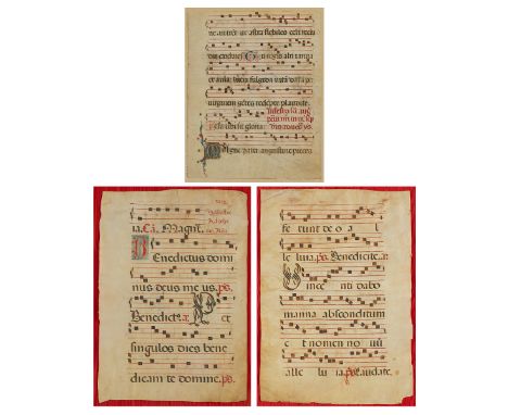 Group of three antiphonary manuscript pages on vellum with Latin text and illuminated capital letters.Unframed; height ranges