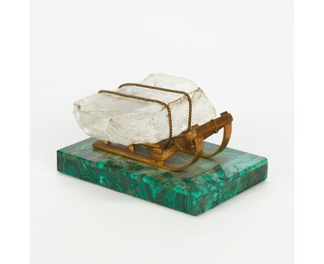 Russian paperweight in the form of a gilt bronze sleigh carrying a large chunk of quartz "ice." Mounted to a malachite base.P