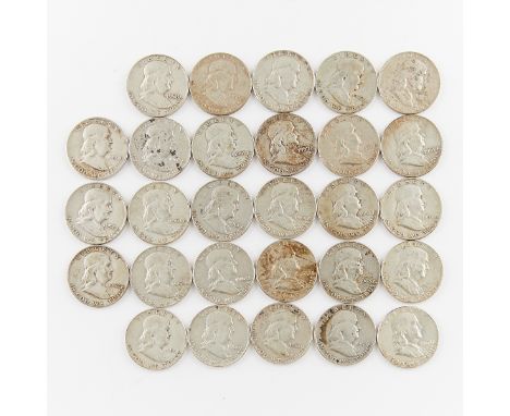 Group of 28 Benjamin Franklin half dollar coins ranging from 1948-1963. Featuring a profile bust of Benjamin Franklin on the 