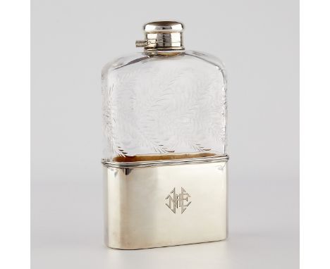 Tiffany &amp; Co., New York, United States. Large glass and sterling silver flask. The cut glass decorated with ferns and etc