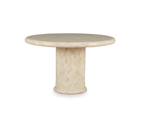 Karl Springer (German, 1931-1991). Tessellated white fossil stone table. With a pedestal base and round top. With a plaque af