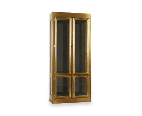 MasterCraft, United States. A brass and glass display cabinet or vitrine with smoked glass back, one of two in this auction. 