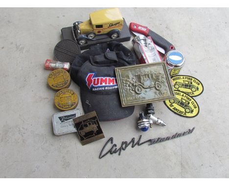 A box containing a quantity of miscellaneous motoring memorabilia including badges, tins, a model car etc 