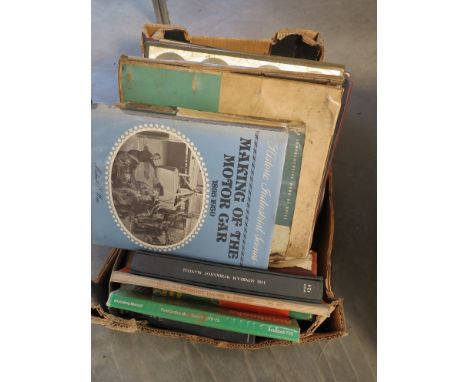 A box of books including The Petrol Engine and Morris 