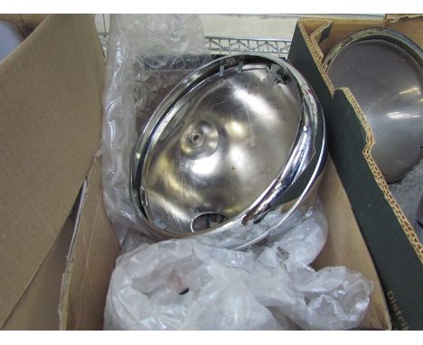 A pair of Lucas L874 indicators and a BSA headlight surround 