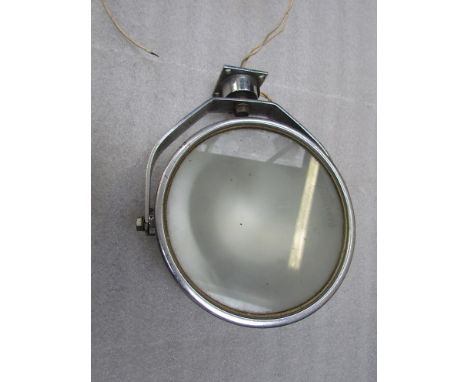 A chromed Francis head lamp 