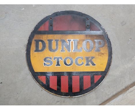 A double sided circular enamel sign "Dunlop Stock" 