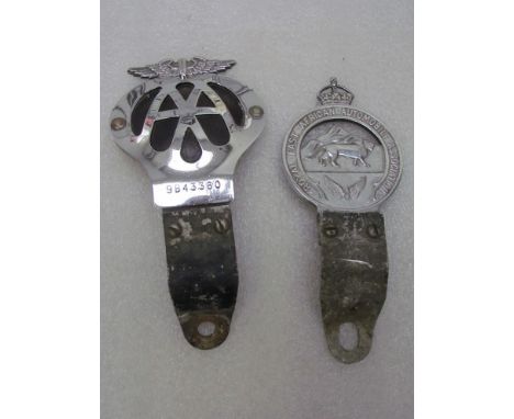 Two vintage car bar badges including "Royal East African Automobile Association" and an AA example 