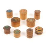 Nine various whitewood Tunbridge ware cylinder boxes, mostly with ring painted decoration, five with