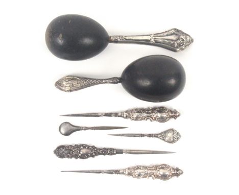 A mixed lot, sewing, comprising two ebonised egg form darners both with silver handles stamped 'Sterling', largest 16cms, an 