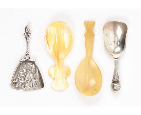 Four caddy spoons, comprising a shovel bowl example with pearl thistle finial, Birmingham 1930 by Joseph Cook and Son, 9cms, 