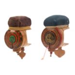 Two whitewood print, paint and label decorated Tunbridge ware sewing clamps, both below original pin