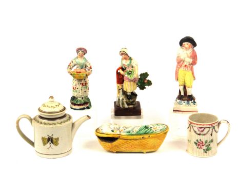 Three Prattware pottery figures and three other pieces, comprising a square base figure of a man, a swan or duck over his sho