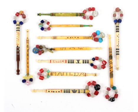 Eleven spot inscribed bone lace bobbins, comprising Maria Mason / Maw / Jane / Jess / Ellen / C M O R / Matilda / Susan / Emm