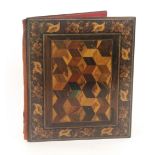 A rosewood Tunbridge ware rectangular book form blotter, the cover with a panel of cube work