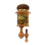 A whitewood print, paint and label decorated Tunbridge ware sewing clamp, the turned frame below a
