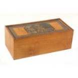 A whitewood print and paint decorated Tunbridge ware rectangular box, plain sides, one end with