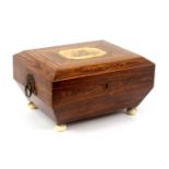 A rosewood sewing box, probably relating to the Tunbridge trade, of sarcophagol form with boxwood