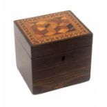 A small coromandel wood Tunbridge ware tea caddy, of rectangular form, the lid with a panel of