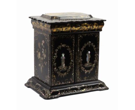 A papier mache table cabinet, circa 1860, raised on a bracket plinth, the sides with pearl embellished floral painted panels 