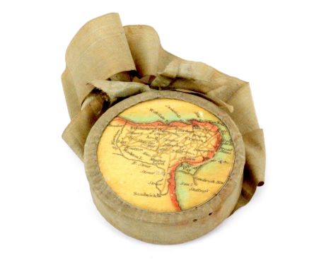 A disc form map and label decorated Tunbridge ware pin cushion, on ribbon suspension, one side with a circular colour map, de