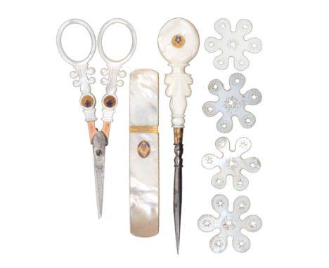 A group of Palais Royal mother of pearl sewing tools, comprising a rectangular rounded end needle case with gilt ferrule and 