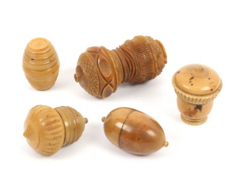 Five vegetable ivory thimble cases, each with thimble comprising a large example extensively decorated and complete with orig