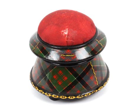 An unusual Tartan ware box form pin cushion, (Clanranold), the base of tapering cylinder form raised on three ball feet, gilt