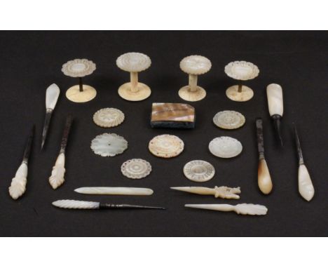A mixed lot - sewing, comprising mother of pearl rectangular pin cushion, 3.6cms, two carved top mother of pearl stilettos, s