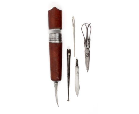 A late 18th Century steel cased etui, of oval section and tapering form covered in mottled brown leather, the pull off top re