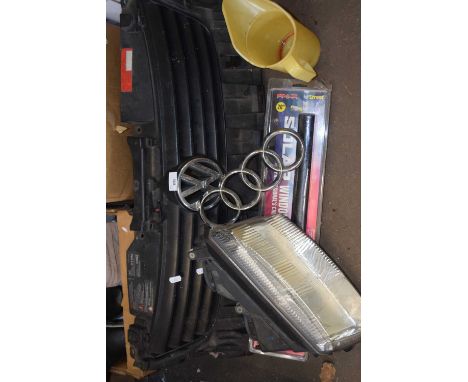 Volkswagon car grill together with a light, Mercedes badge, Ford badge etc