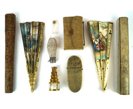 A mixed collection of vintage fashion accessories, Circa 1900-1930
To include a carved bone fan with printed figural and land