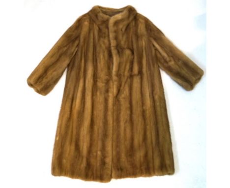 A ladies vintage mink fur three quarter length coats, second half 20th Century
The light brown coat with elongated pelts with