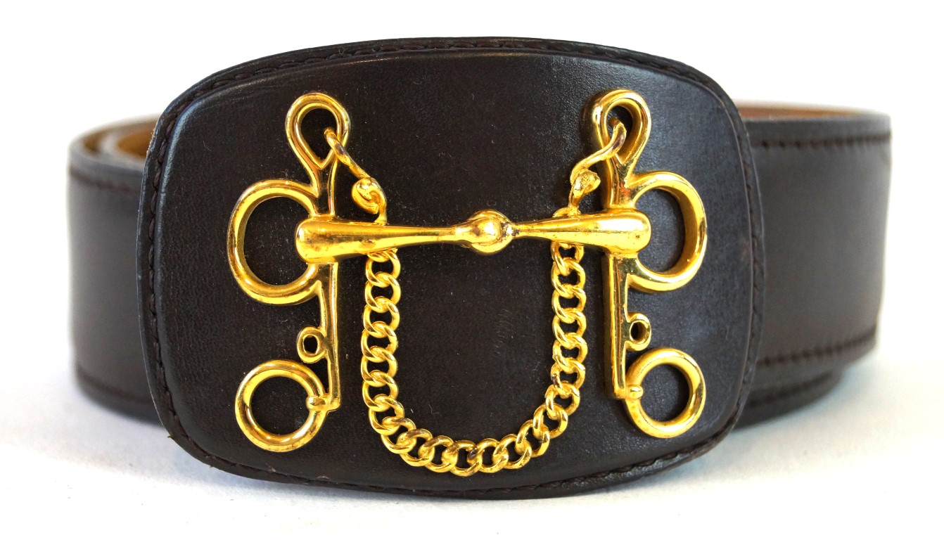 A ladies Hermès 'horse bit' leather belt The dark brown leather belt