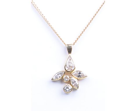 Tiffany & Co: A diamond abstract pendant
The pendant comprising of pear-cut, marquise-cut and brilliant-cut diamonds, set in 