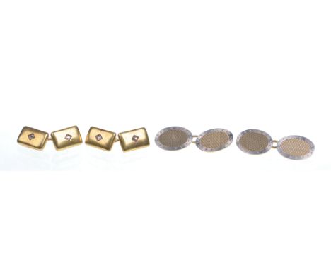 A 20th century pair of diamond set cufflinks
Of rectangular form, with an old-cut diamond centrally set, together with a pair