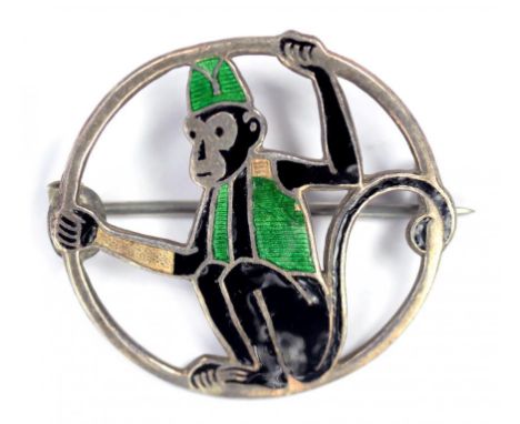 A CHARLES HORNER SILVER AND BLACK AND TRANSLUCENT GREEN ENAMEL OPENWORK MONKEY BROOCH, MAKER'S MARK, CHESTER 1922 (ENAMEL SLI