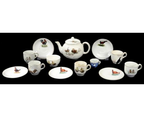 A WILKINSON LTD EARTHENWARE CHILD'S TEA SERVICE DECORATED WITH BIRDS, TEAPOT AND COVER 9.5CM H, PRINTED MARK, C1930 AND A MIN