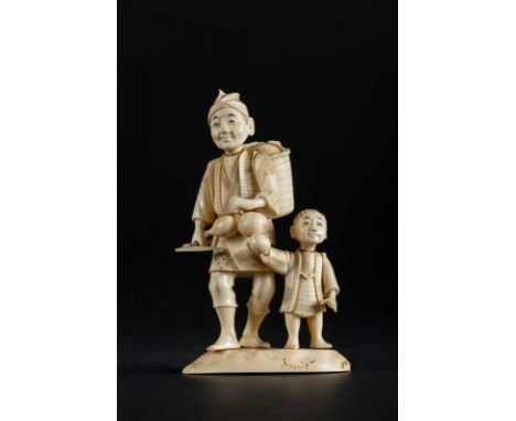  An ivory okimono depicting a farmer and a child, signed at the baseJapan, 19th century Cm 9,00 x 16,00 x 7,00 22.00 % buyer'