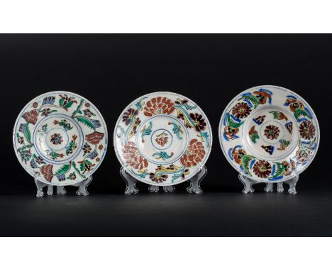  Three glazed fritware Kutahya dishesTurkey, Kutahya, 18th century Cm 18,50 x 4,50 22.00 % buyer's premium on the hammer pric