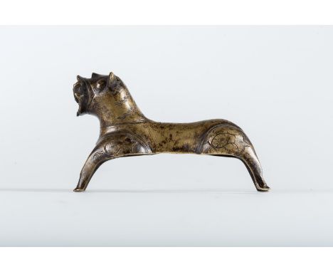  A metal lion Possibly India, 17th century A similar object has been sold in this rooms June 2016, auction 200, lot 569.Cm 17