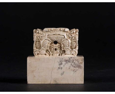  A jade chicken bone seal surmounted by a two dragon handleChina, possibly Ming dynasty Seven characters engraved mark seal C