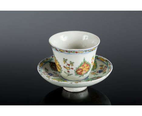  A Kutahya cup and saucer Turkey, Kutahya, 18th centuryCm 11,00 x 8,00 22.00 % buyer's premium on the hammer priceVAT margin 