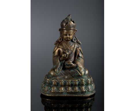  A small gilt copper figure of PadmasambhavaTibet, 17th century Cm 5,00 x 7,00 22.00 % buyer's premium on the hammer priceVAT