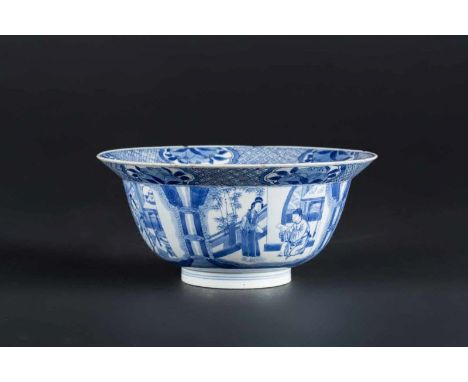  A blue and white porcelain bowl painted with children and ladies at leisure and bearing a Kangxi mark at the baseChina, Qing