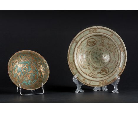  Two pottery bowls in the Lajvardina styleIran, 19th century or earlier  Cm 23,50 x 6,00 22.00 % buyer's premium on the hamme