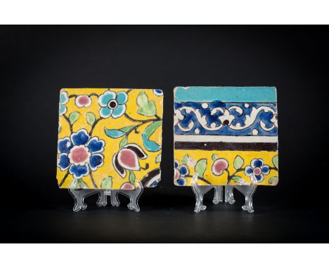  A pair of cuerda seca yellow ground tilesIran, Safavid period, 17th century Cm 19,00 x 2,00 22.00 % buyer's premium on the h