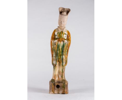  A sancai glazed pottery figure of a standing dignitary China, Qing dynasty or earlierCm 15,00 x 69,00 22.00 % buyer's premiu