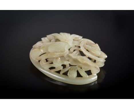  A jade carving depicting cranes and lotus flowers China, Ming dynasty, 17th centuryCm 7,20 x 6,00 22.00 % buyer's premium on