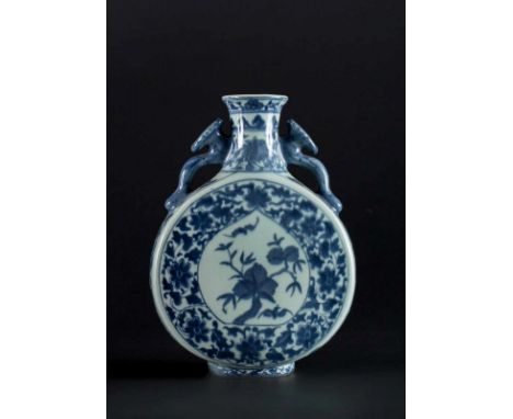  A blue and white porcelain flask painted with peaches and branches and bearing a Daoguang six characters seal mark at the ba